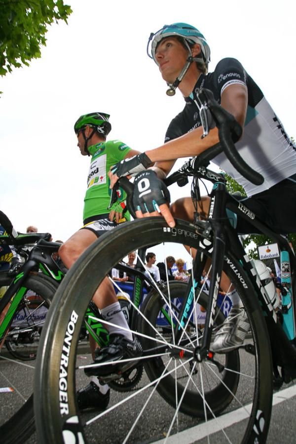 Andy Schleck and Mark Cavendish await the start