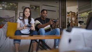 People playing with wireless controllers connected to ASUS ROG Ally.