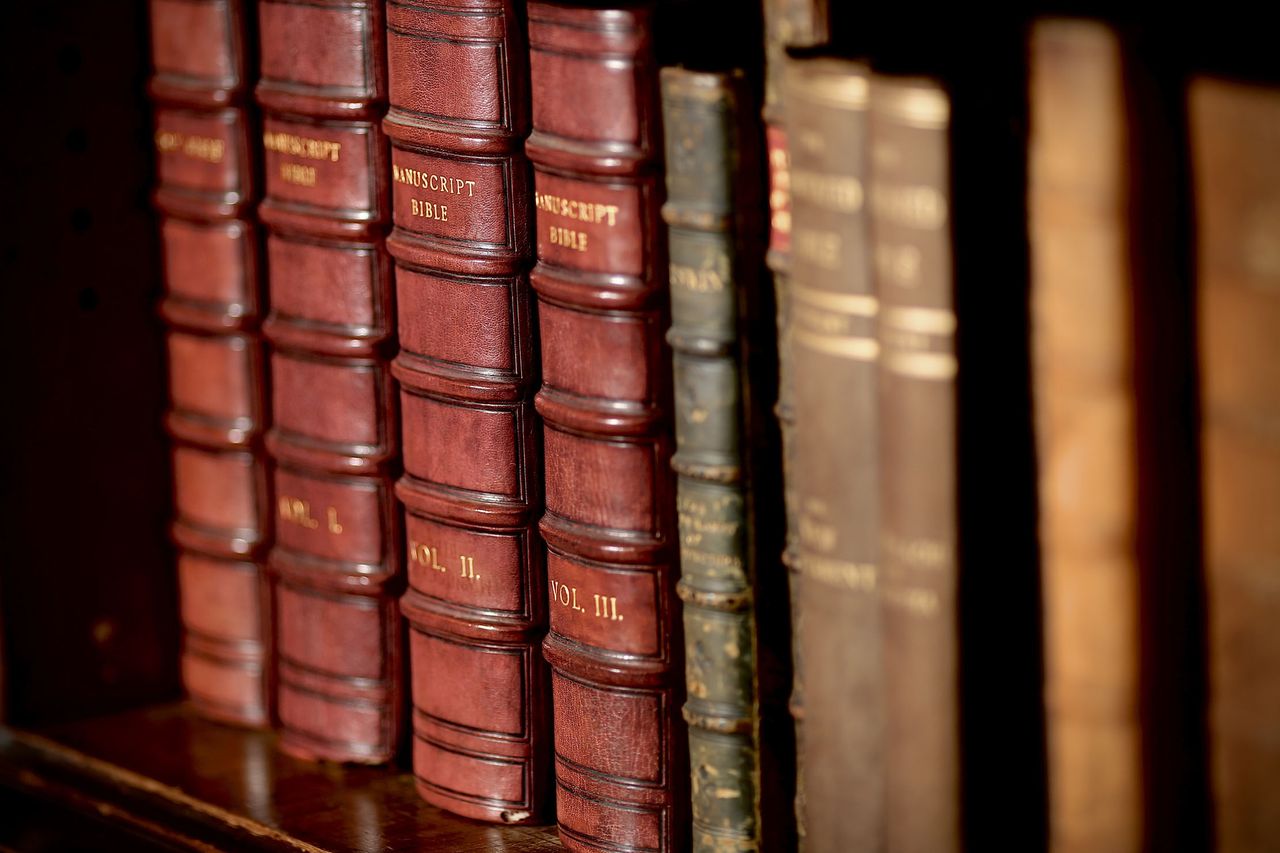 Sally Raikes and the hand-written bible at Treberfydd House in Brecon