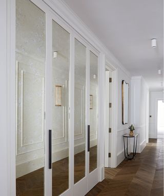 Mayfair apartment with hallway mirrored cabinets