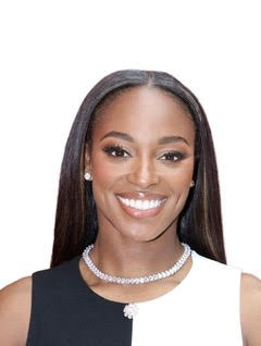 a black woman in a black and white top with a diamond necklace