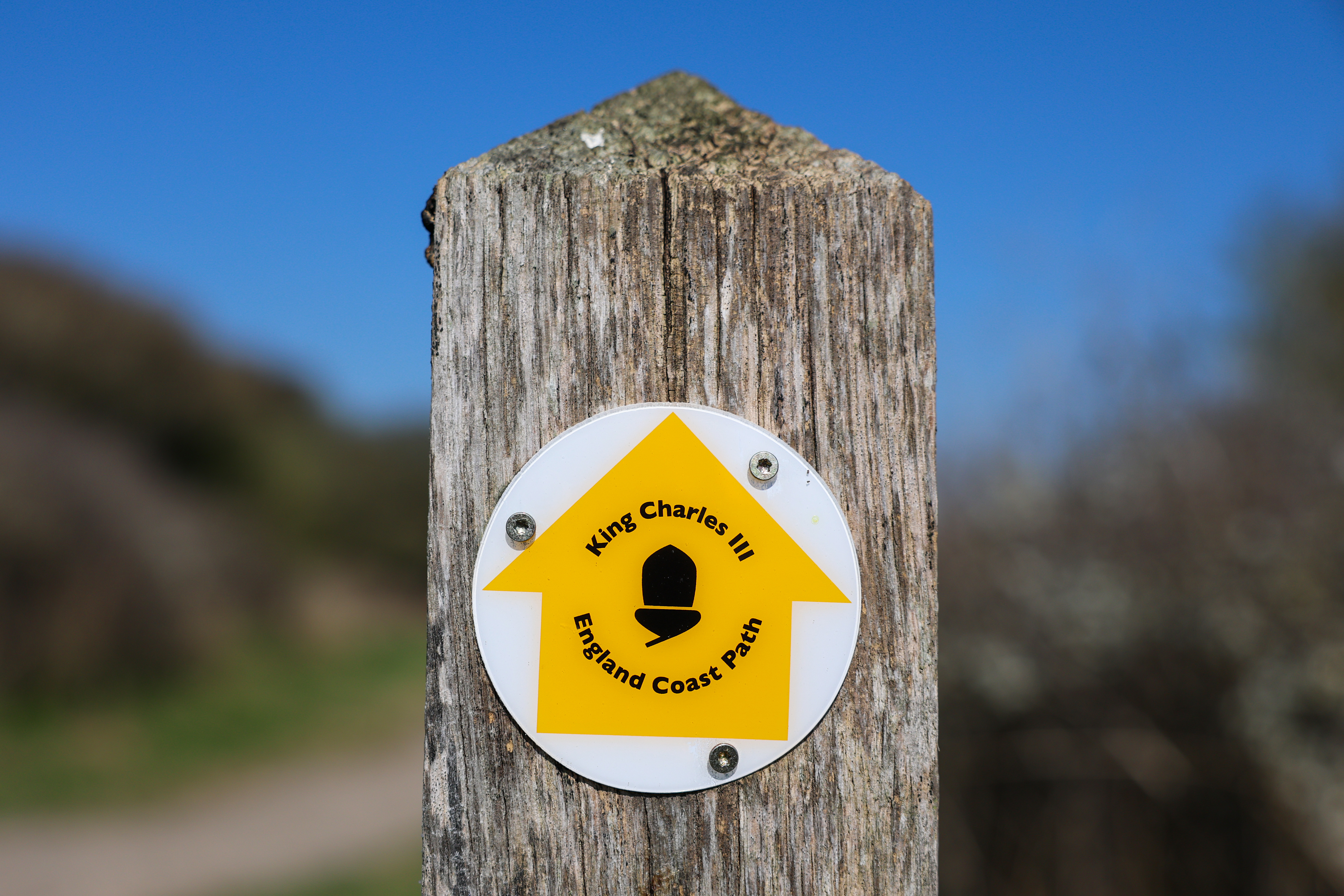 A view of the path sign as the King Charles III England Coast Path at Seven Sisters National Nature Reserve is opened.