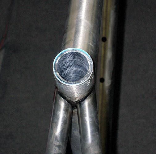 Seven installs a fibreglass insert into the seat tube to prevent metal-to-metal adhesion that happens on less-prepared frames.