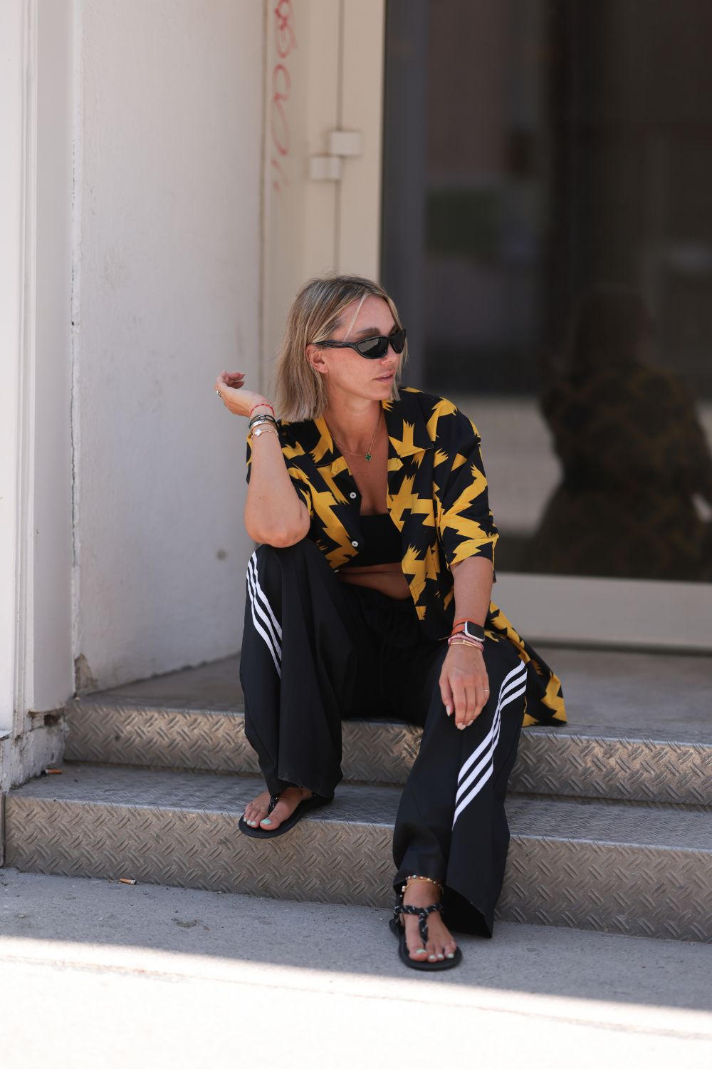 a street style star wearing rope sandals