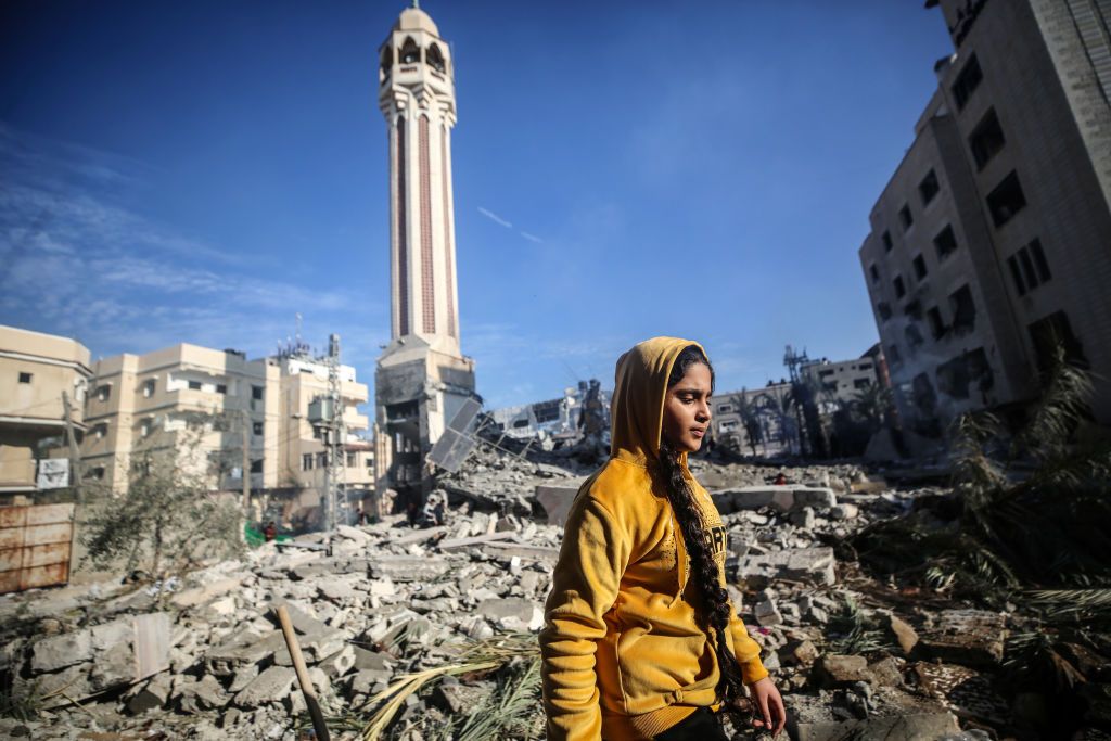 Palestinians are inspecting the debris at the Jaffa Mosque, which was hit by an Israeli bombardment, in Deir el-Balah, in the central Gaza Strip