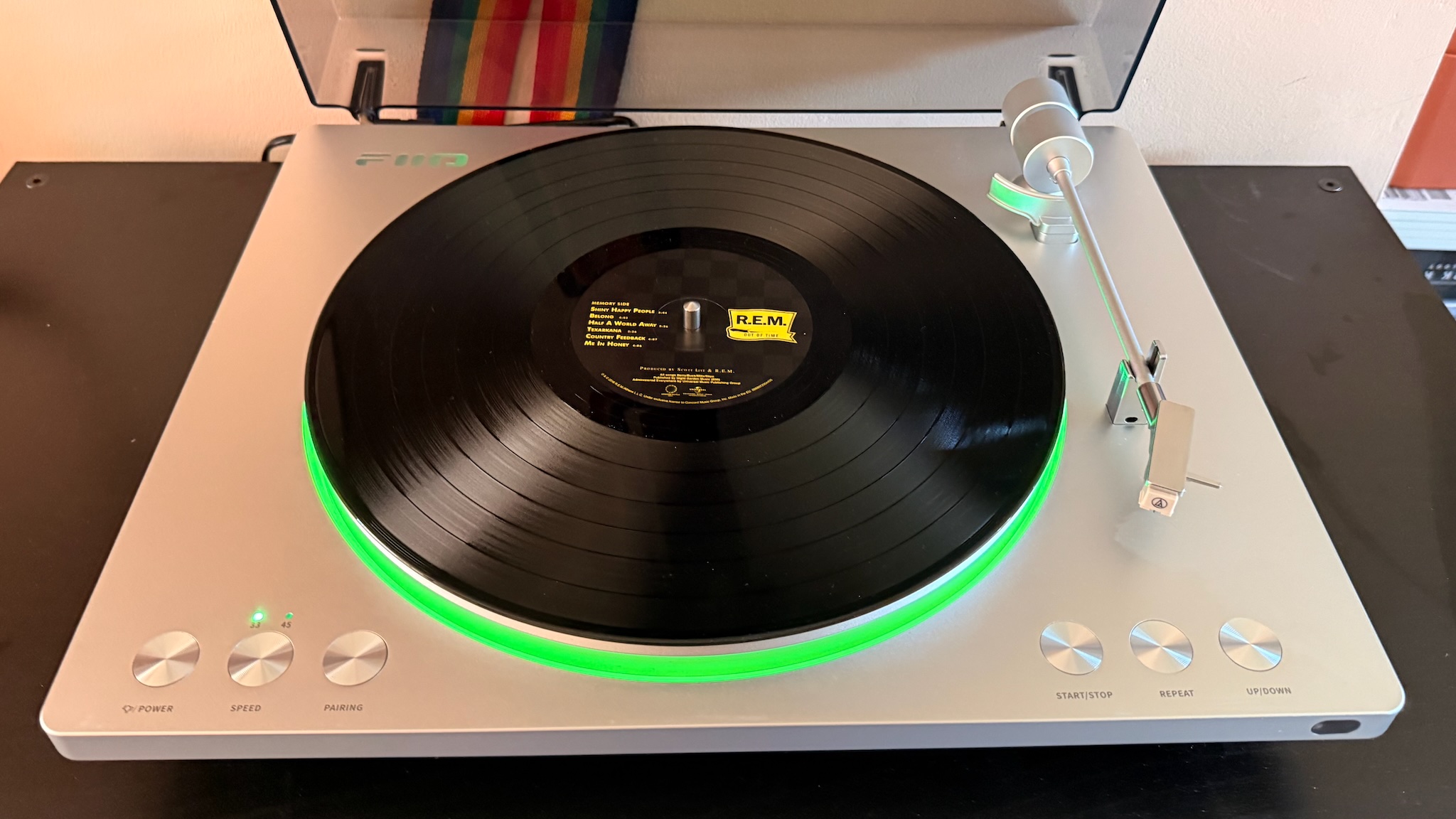 FiiO TT13 turntable shot from above with green illumination