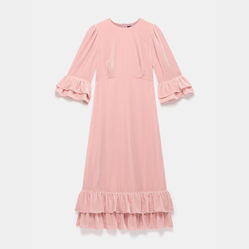 A cutout of a pink velvet ruffled dress by Mint Velvet