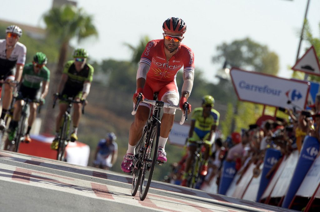 A bandaged Nacer Bouhanni (Cofidis) finishes