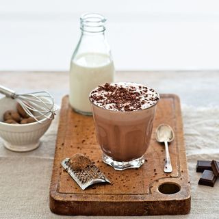 Hot chocolate on chopping board