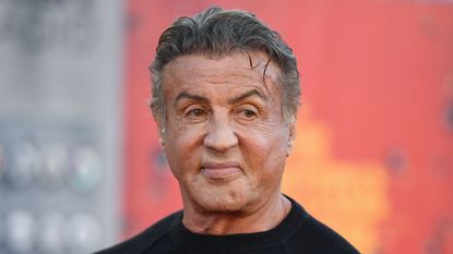 sylvester stallone on a red background