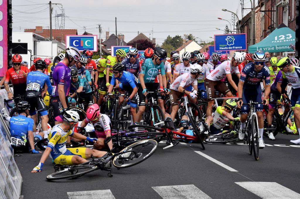 Riders crash as they cross the finish line during the 161 km between Dunkirk and Aniche first stage of the 4 jours de Dunkerque Four days of Dunkirk cycling race in Aniche northern France on May 3 2022 Dutch rider Arvid de Kleijn Human Powered Health was declared winner of the first stage of the Four Days of Dunkerque on May 3 2022 in Aniche after Australian rider Sam Welsford was dropped Welsford Team DSM was the first to cross the line but was considered responsible for the crash that sent Arnaud De Lie Lotto Soudal and Daniel McLay Arkea Samsic to the ground Photo by FRANCOIS LO PRESTI AFP Photo by FRANCOIS LO PRESTIAFP via Getty Images