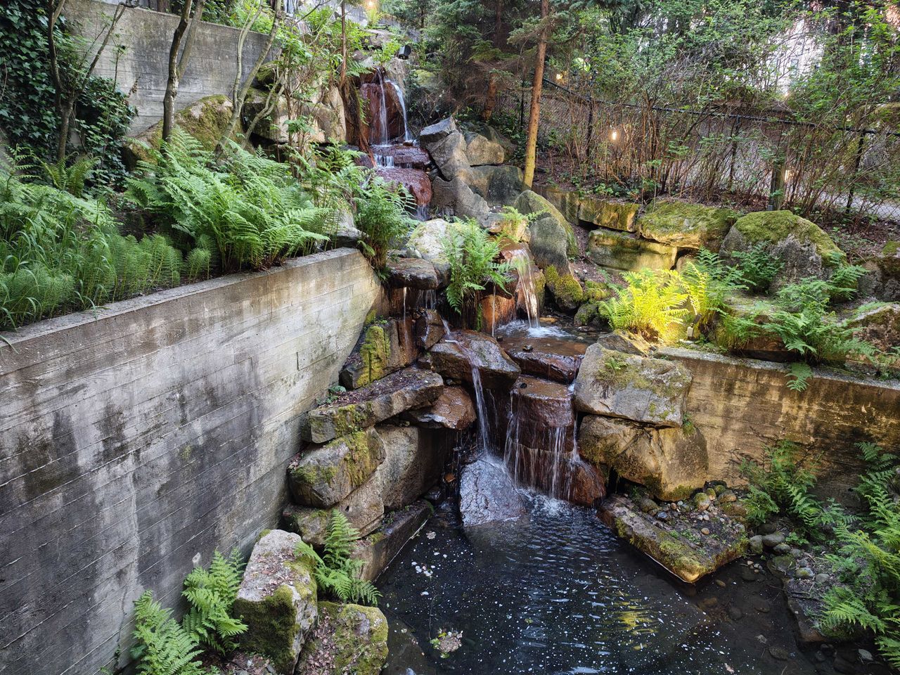 A on outdoor water feature and a pond