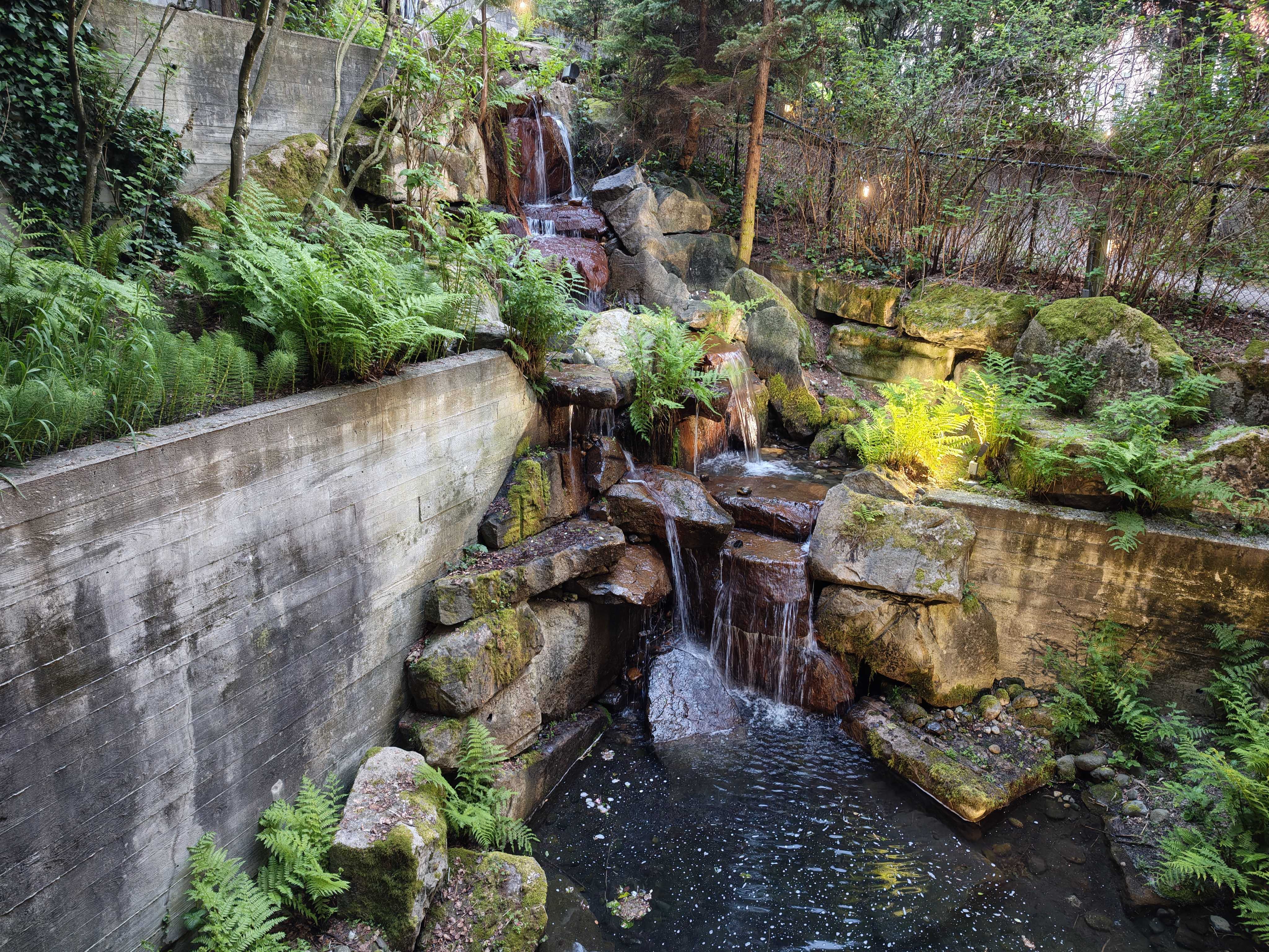 A on outdoor water feature and a pond