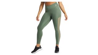 Green Gymshark leggings with sheer sides and pockets