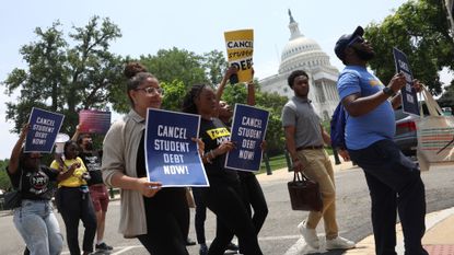 Protesters march for student loan forgiveness in Washington, D.C., in 2023.