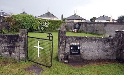 Irish government to investigate mass graves at old homes for unwed mothers