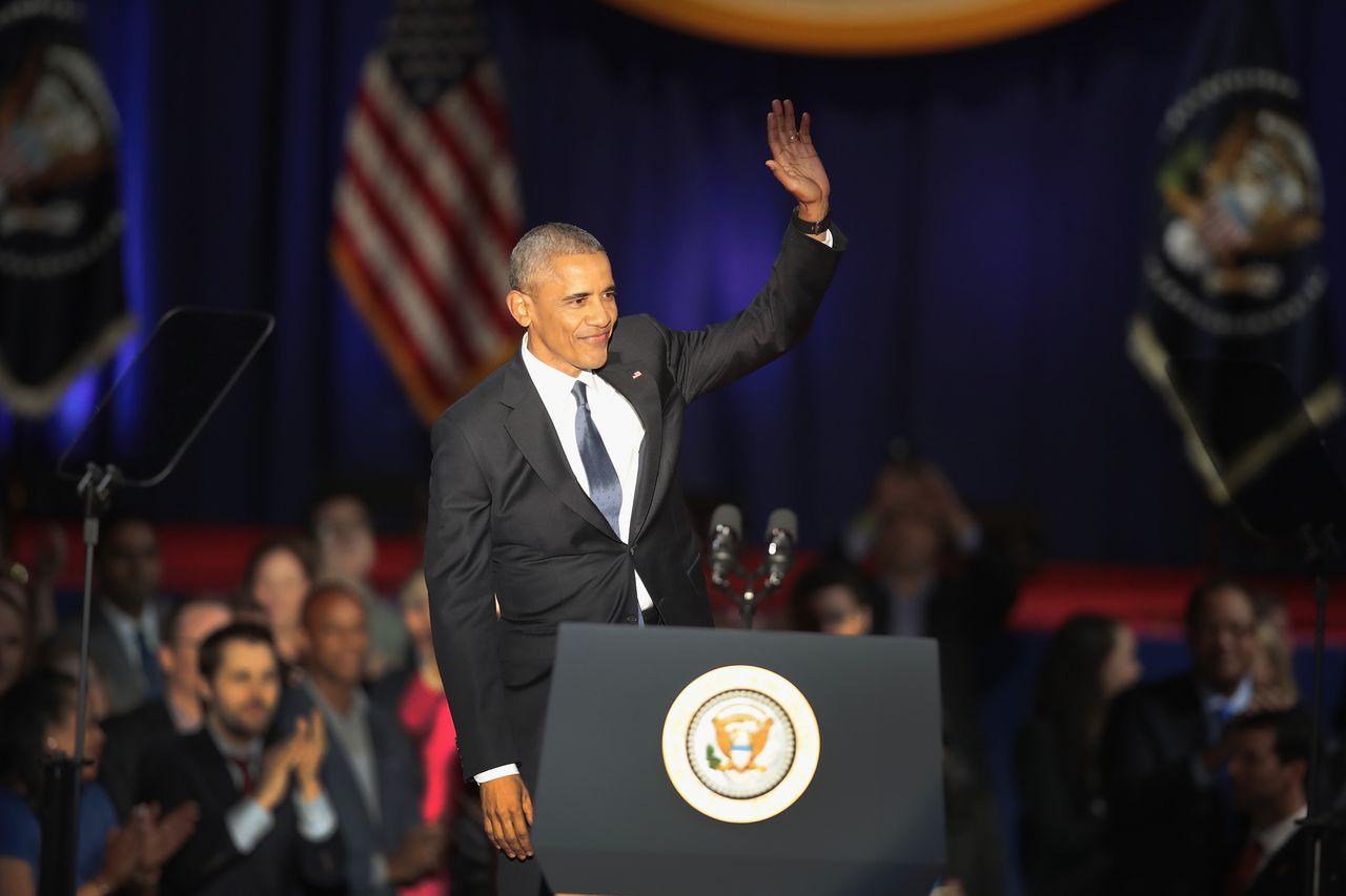 Barack Obama waves to crowds