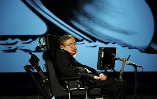 Famed physicist Stephen Hawking delivers a speech titled "Why We Should Go to Space" during a lecture honoring NASA's 50th anniversary in 2008. Hawking died at age 76 on March 14, 2018.