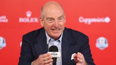 Jim Furyk talks to the media