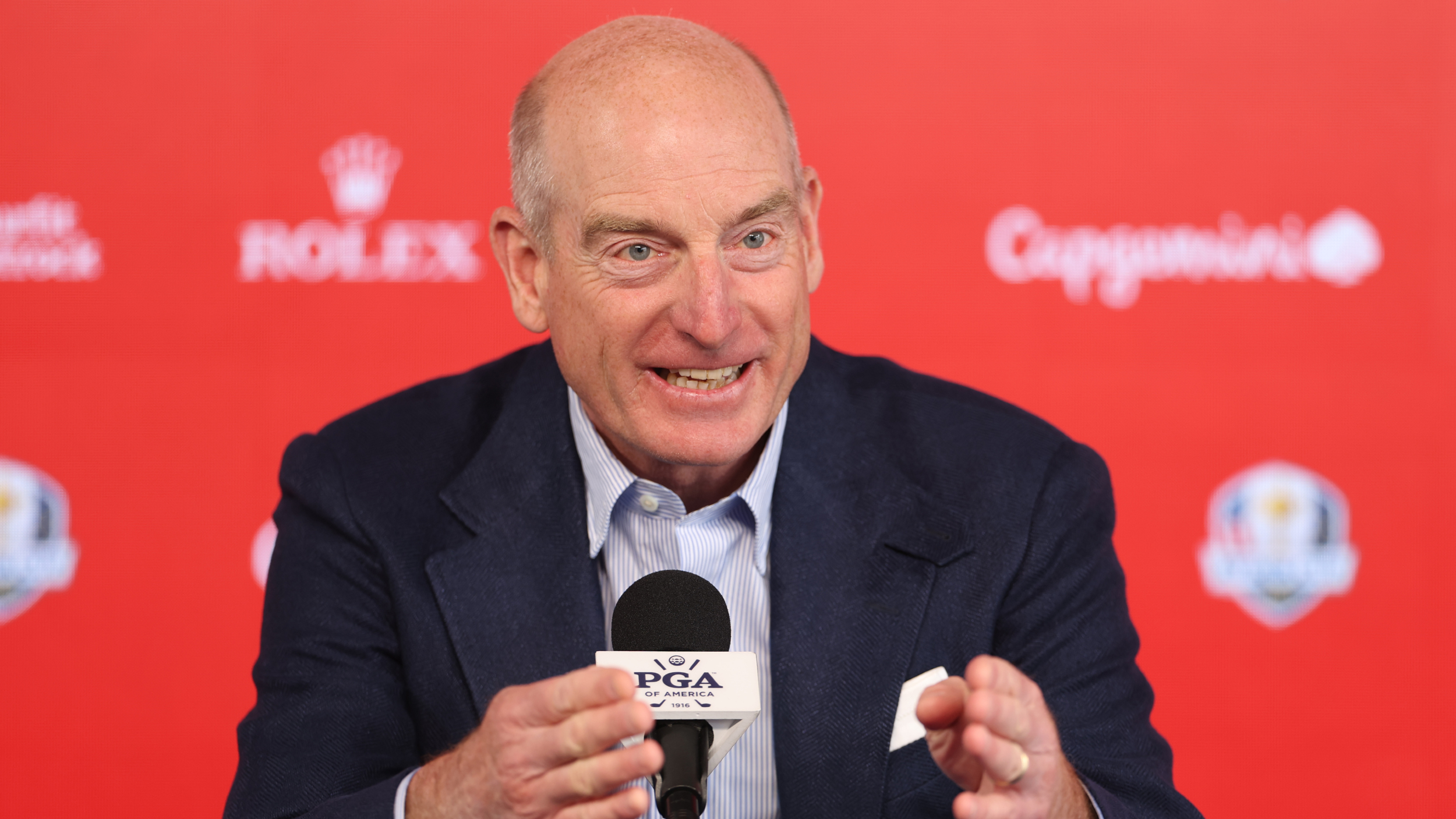 Jim Furyk talks to the media