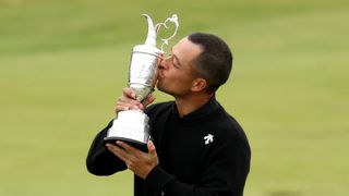 Xander Schauffele and Claret Jug