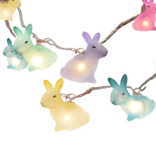 Two silver strings of seven bunny shaped lights in mint, lavender, yellow, and bright pink