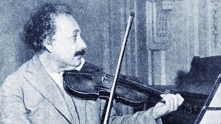 Albert Einstein playing violin.