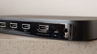 Philips Hue Play HDMI Sync Box laying on its port-side