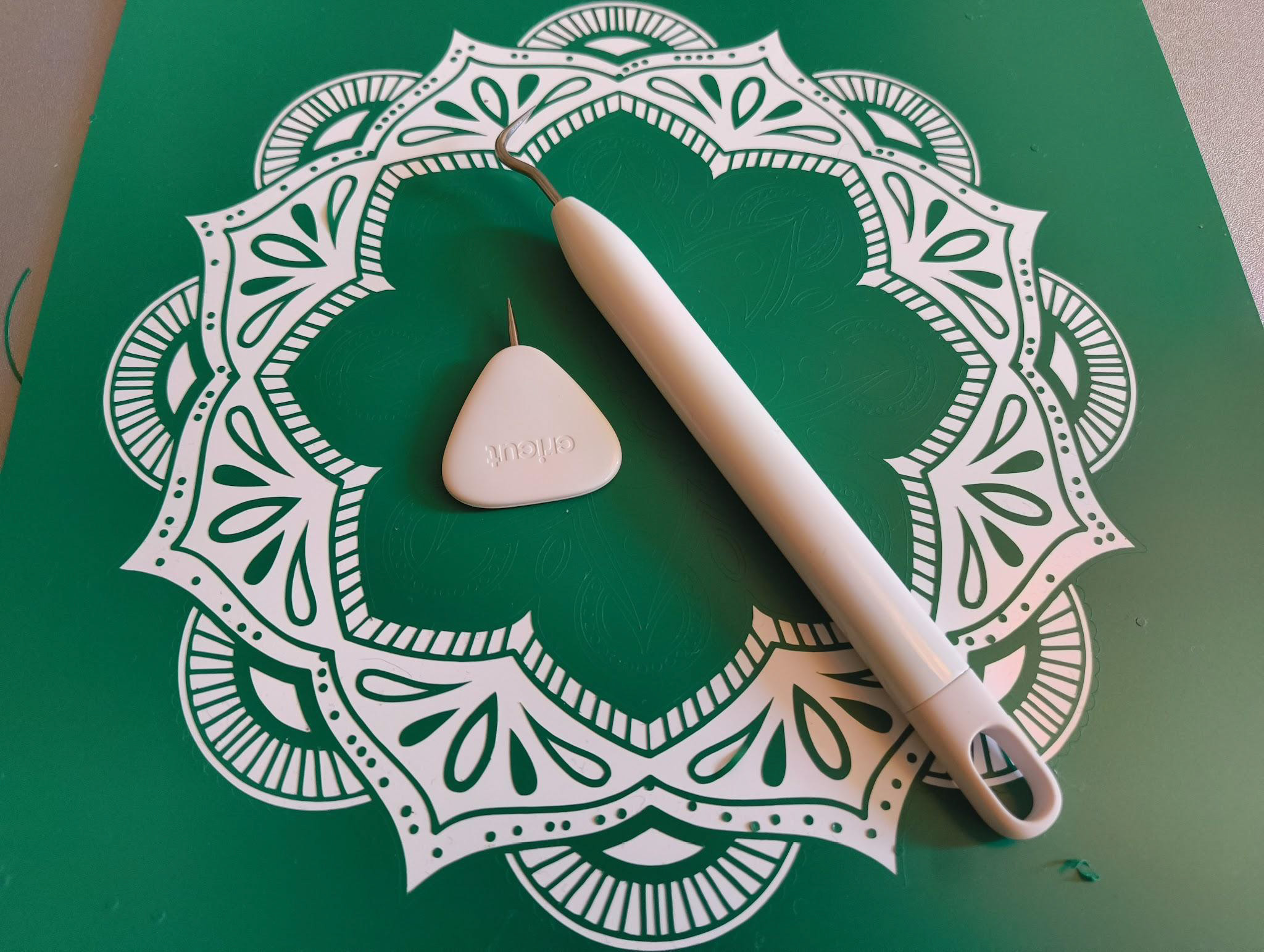 How to use Cricut transfer tape; photos of a person making a print design
