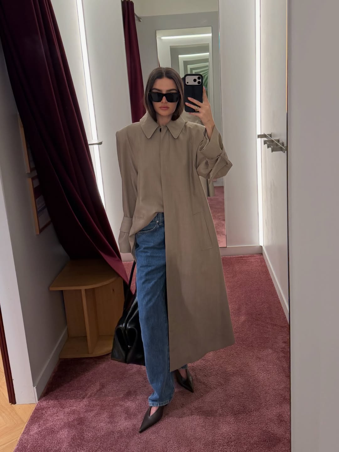 @georginadowne wearing a single-breasted trench coat