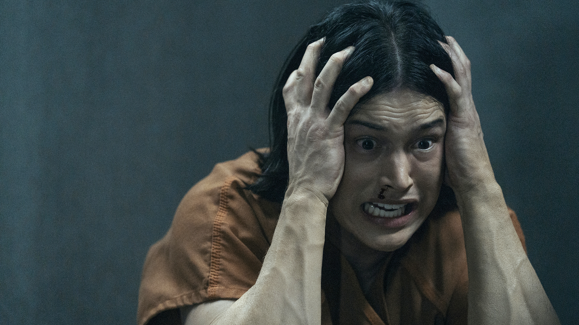 Jordan holding his head in pain in Gen V season 2 episode 5