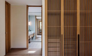 View through to bedroom with wooden floors and features at Sabina Estates Villa