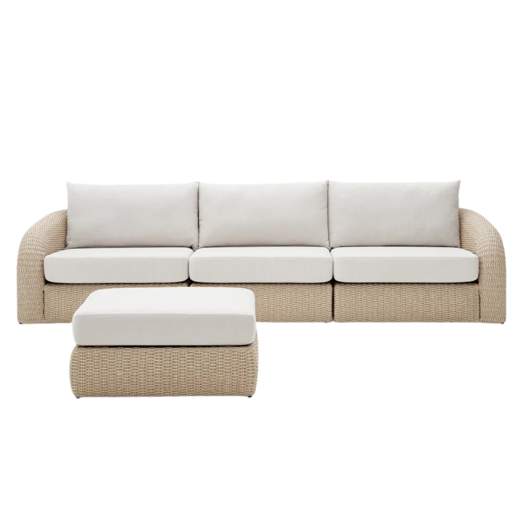 outdoor sofa with a wicker frame and ottoman and white upholstered cushions