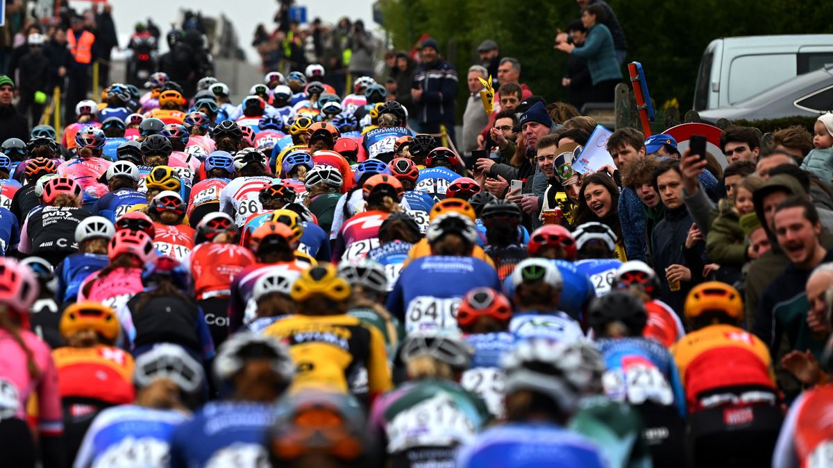  A general view of the women&#039;s peloton competing while fans cheer during the Tour of Flanders 2023