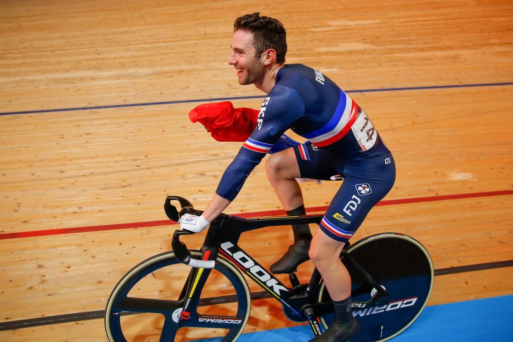 Frances Benjamin Thomas celebrates Gold in the mens omnium elimination race and points race at the UCI track cycling World Championship at the velodrome in Berlin on February 29 2020 Photo by Odd ANDERSEN AFP Photo by ODD ANDERSENAFP via Getty Images