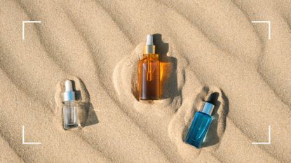 A selection of the best body oil pictured in the sand 