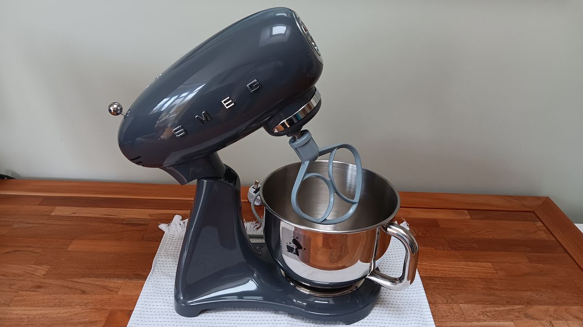 Slate gray Smeg stand mixer with raised head