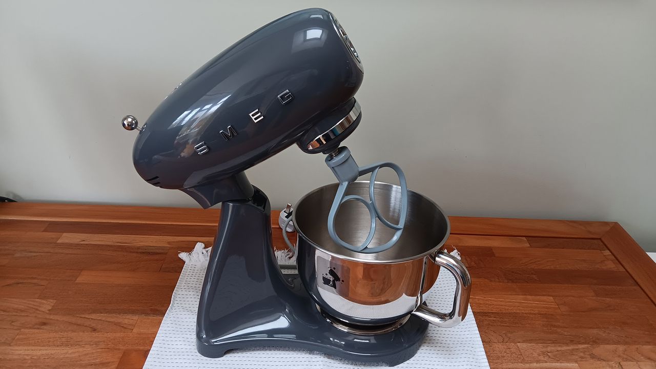Slate gray Smeg stand mixer with raised head