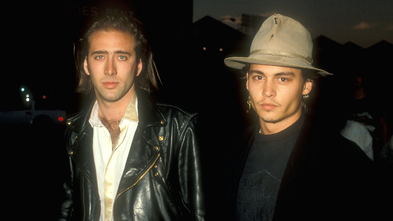 Nicolas Cage &amp; Johnny Depp at the Cinerama Dome in Los Angeles, California