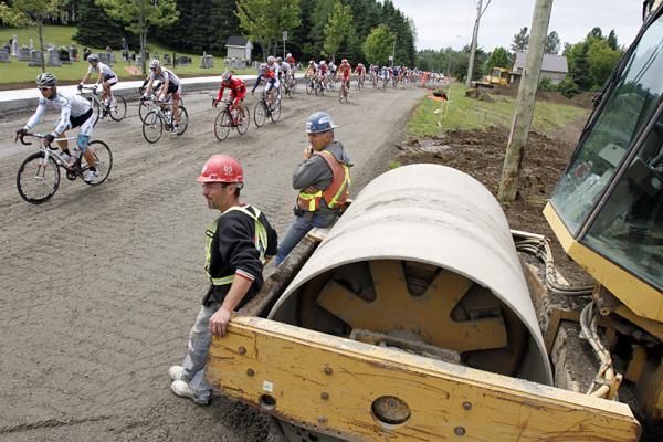 Construction workers wonder what all the fuss is about this bike caper...