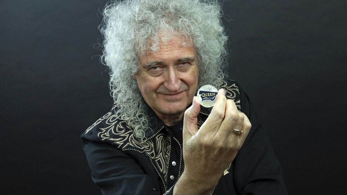 Queen&#039;s Brian May with the new £5 coin