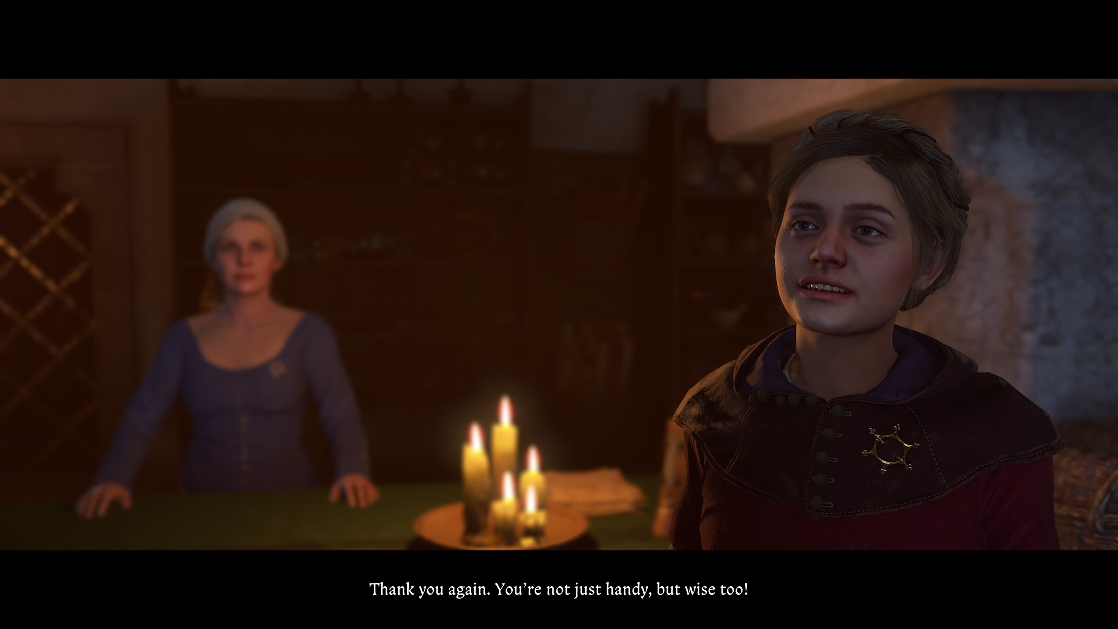 Kingdom Come Deliverance 2 screenshot of a woman thanking Henry for imparting his wisdom at the end of a blacksmithing commission in Kuttenberg