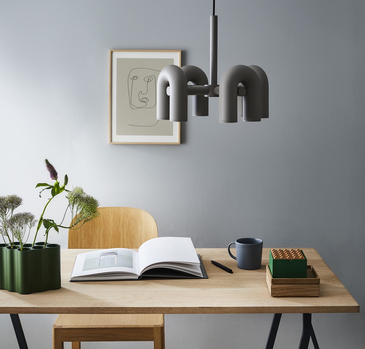 cirkus chandelier above a home office desk