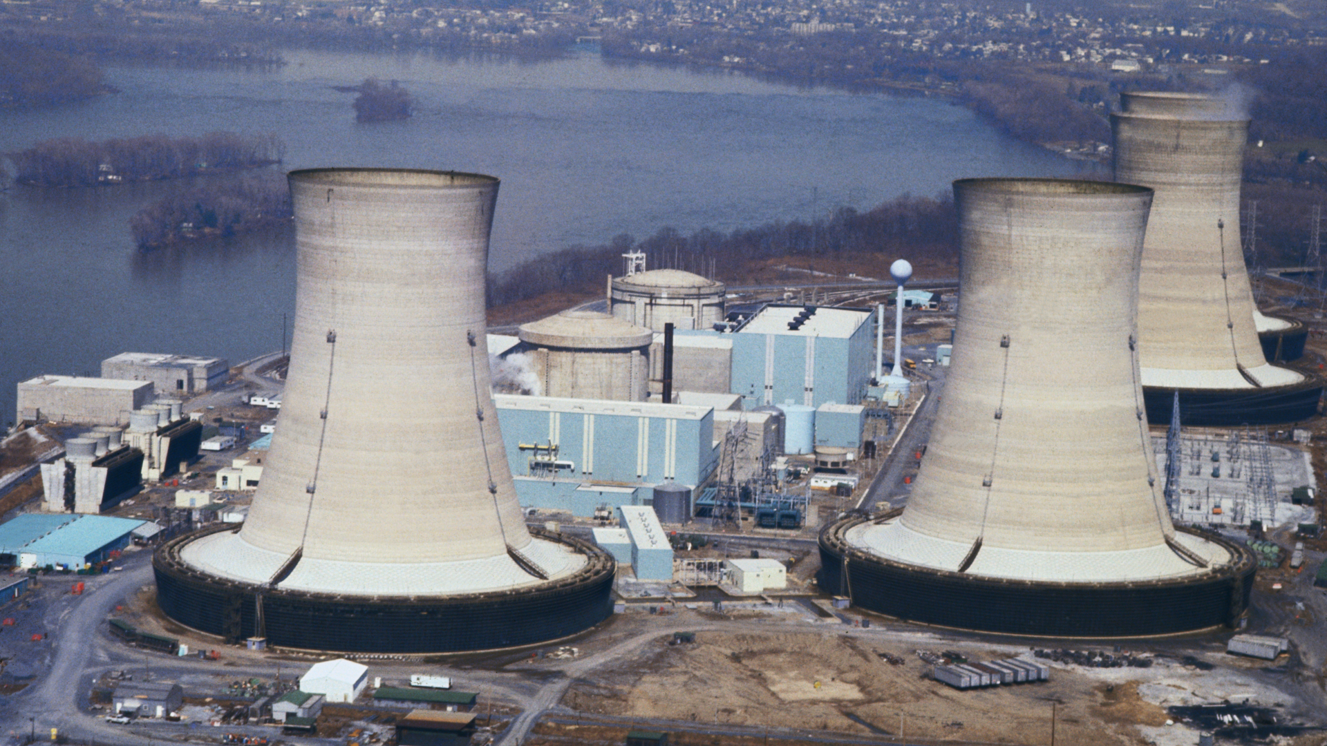The four cooling towers at the Three Mile Island nuclear power plant shown in 1979, not in operation after a leak in the cooling system shutdown the plant.