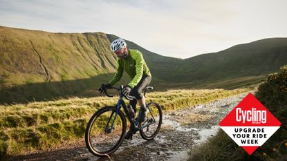 Image shows a person riding a gravel bike