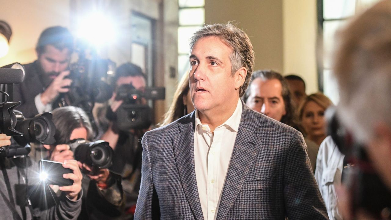 Michael Cohen enters court