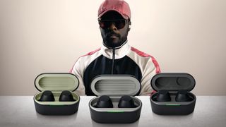will.i.am standing behind the three models of xboom Buds from LG
