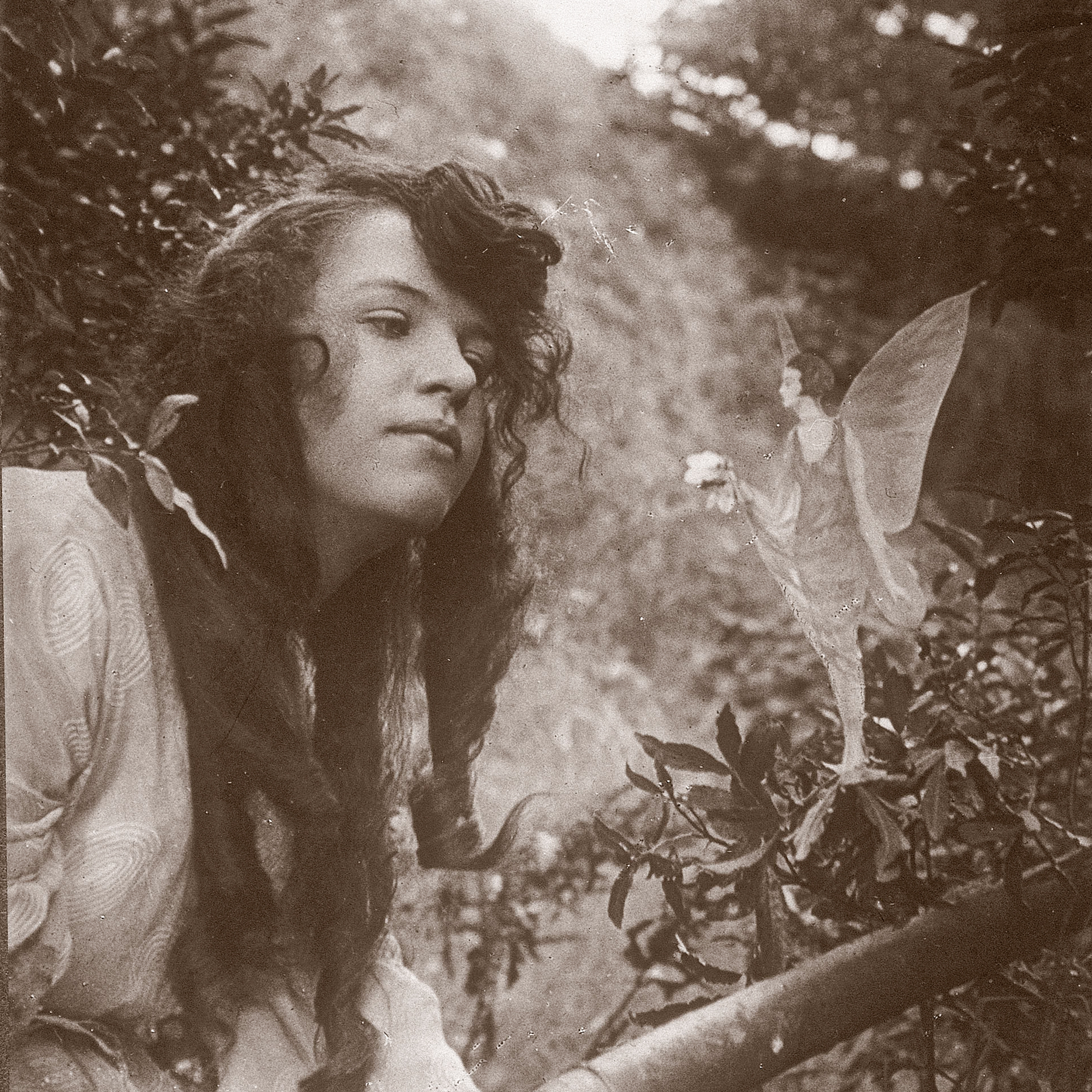 UNITED KINGDOM - OCTOBER 08: In the Summer of 1917, 15-year-old Elsie 'Iris' Wright (1901-1988) and her 10-year-old cousin Frances 'Alice' Griffiths (1907-1986) claimed to have photographed fairies in a beck behind Elsie's home in Cottingley, near Bradford. Although Elsie later admitted the photographs were fakes, Frances was more reticent. To her dying day she claimed that the girls had seen fairies, and that at least one of the photographs was genuine. (Photo by SSPL/Getty Images)