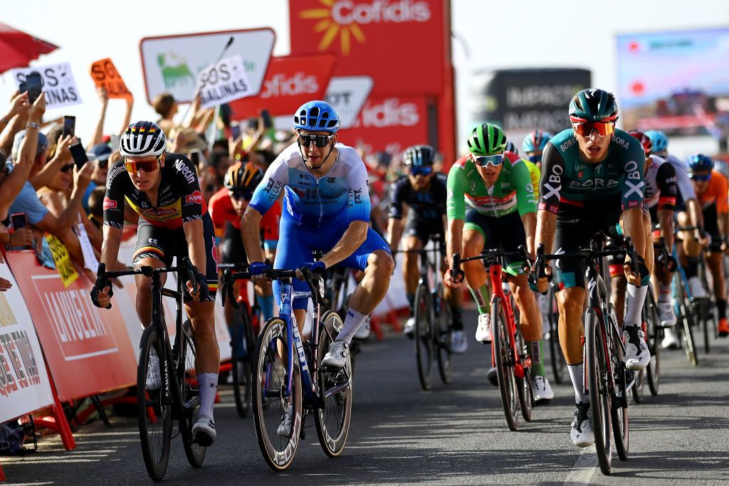 CABO DE GATA SPAIN AUGUST 31 Kaden Groves of Australia and Team BikeExchange Jayco celebrates winning ahead of Danny Van Poppel of Netherlands and Team Bora Hansgrohe and Tim Merlier of Belgium and Team AlpecinDeceuninck during the 77th Tour of Spain 2022 Stage 11 a 1912km stage from ElPozo Alimentacin Alhama de Murcia to Cabo de Gata LaVuelta22 WorldTour on August 31 2022 in Cabo de Gata Spain Photo by Tim de WaeleGetty Images
