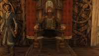 A jarl sits on his throne in Skyrim.
